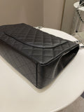 Chanel Classic Quilted Maxi Single Flap Black Caviar