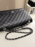 Chanel Classic Quilted Maxi Single Flap Black Caviar