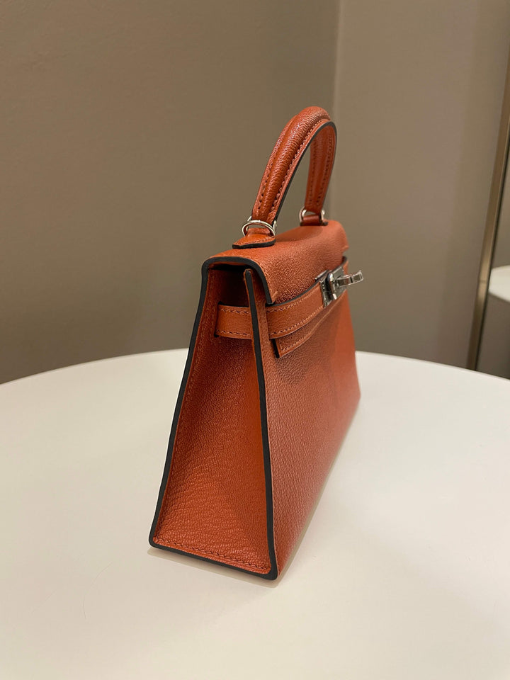 Hermes Mini Kelly 20 Cuivre Chèvre / Rose Mexico