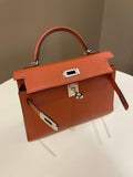 Hermes Mini Kelly 20 Cuivre Chèvre / Rose Mexico