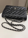 Chanel Classic Quilted Jumbo Double Flap Black Caviar