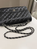 Chanel Classic Quilted Jumbo Double Flap Black Caviar
