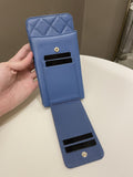 Chanel Quilted Phone Holder with Chain Paradise Blue Caviar