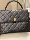 Chanel Kelly Quilted Top Handle Flap Black Caviar