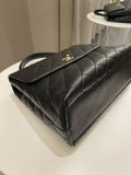Chanel Kelly Quilted Top Handle Flap Black Caviar