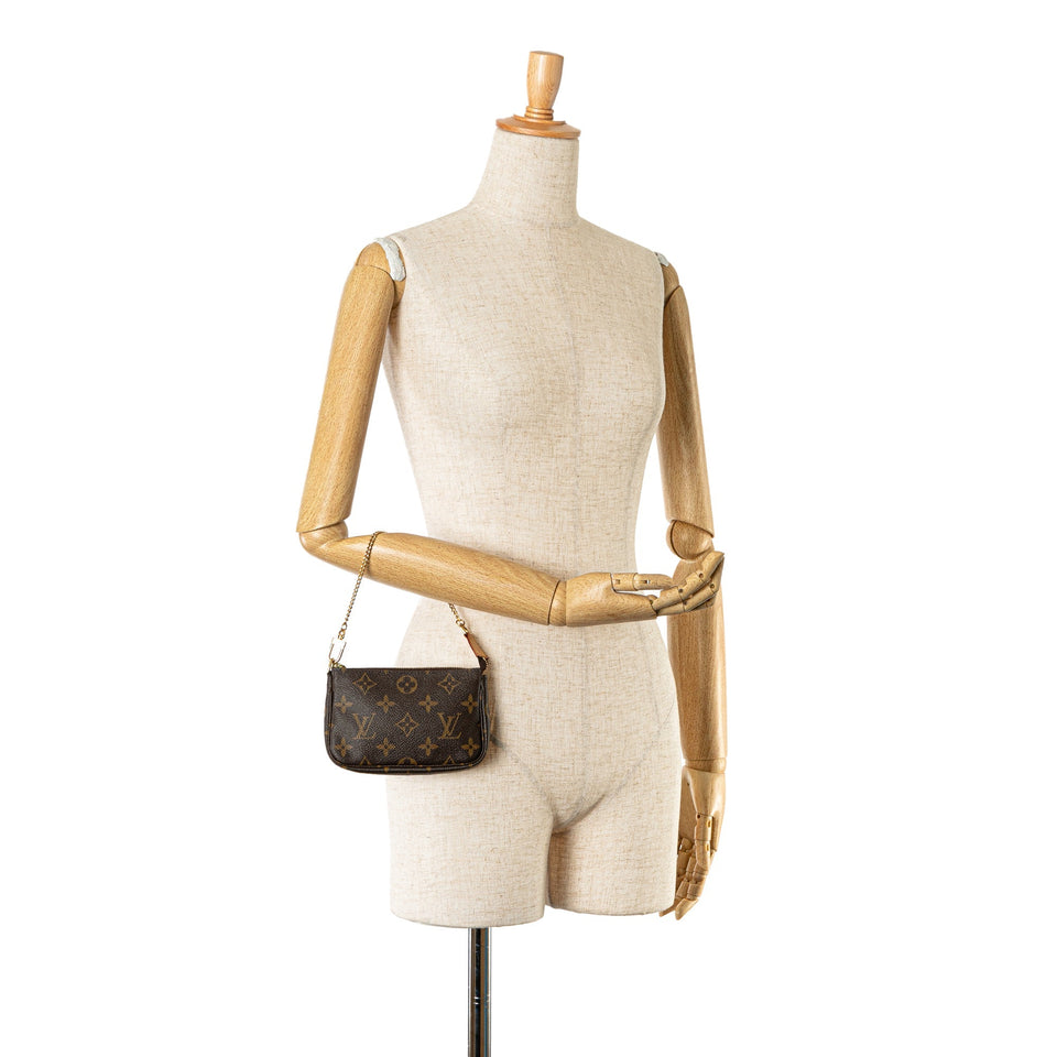 Brown Louis Vuitton Monogram Mini Pochette Accessoires Handbag