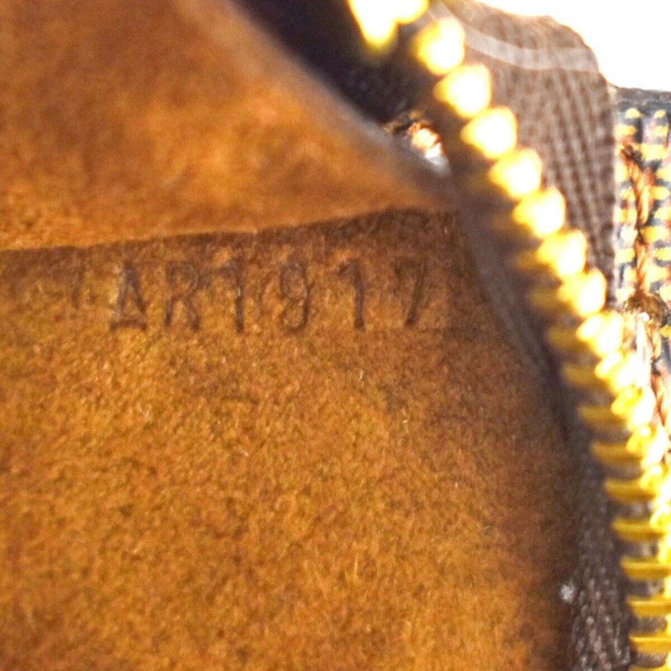 Louis Vuitton Trousse De Toilette  Canvas Clutch Bag