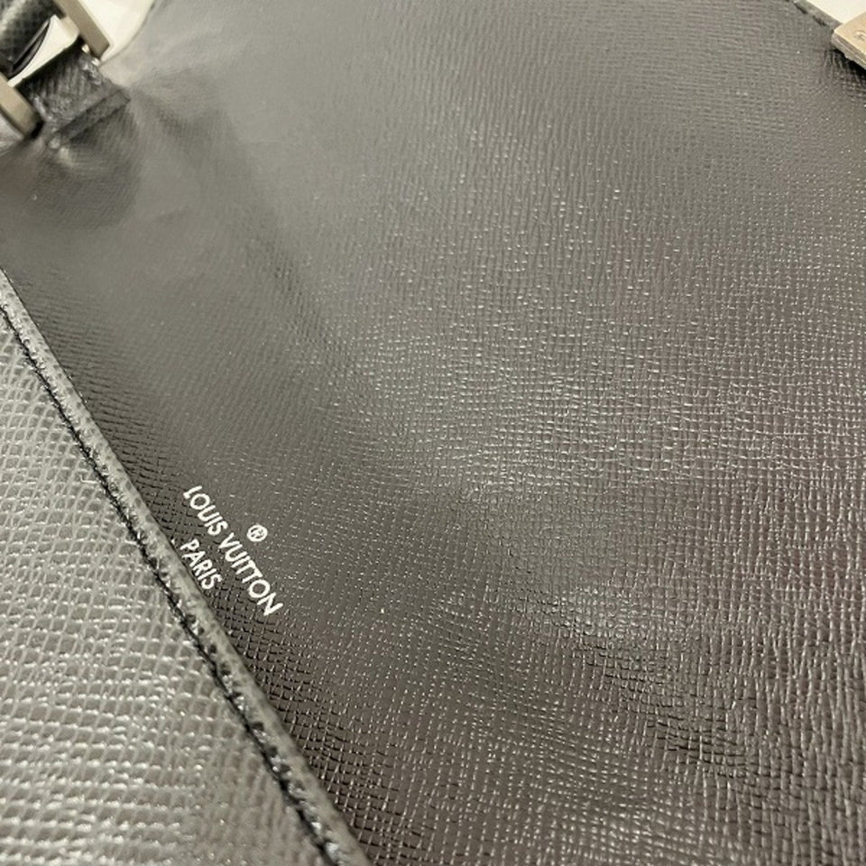 Louis Vuitton Selenga  Leather Clutch Bag