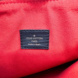 Louis Vuitton Tuileries  Canvas Clutch Bag