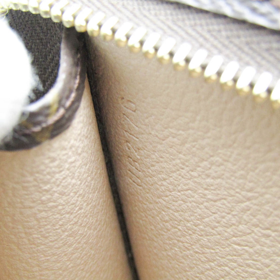 Louis Vuitton Trousse De Toilette  Canvas Clutch Bag