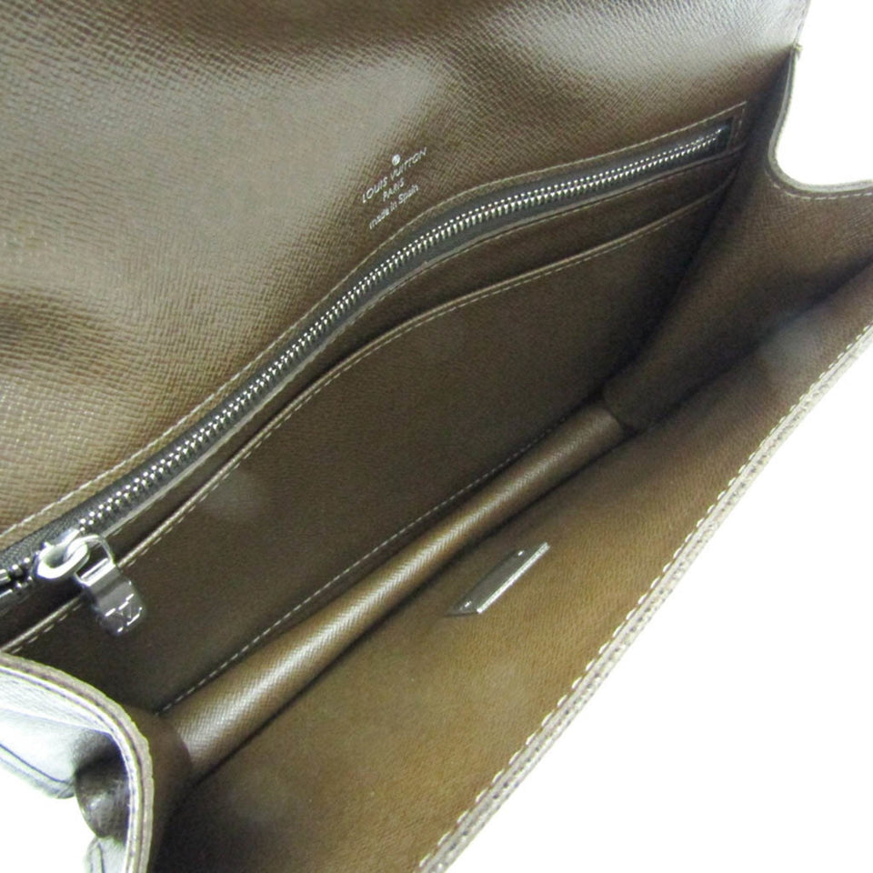 Louis Vuitton Selenga  Leather Clutch Bag
