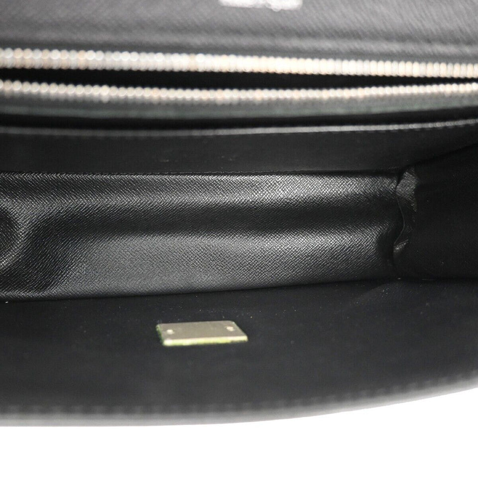 Louis Vuitton Selenga  Leather Clutch Bag