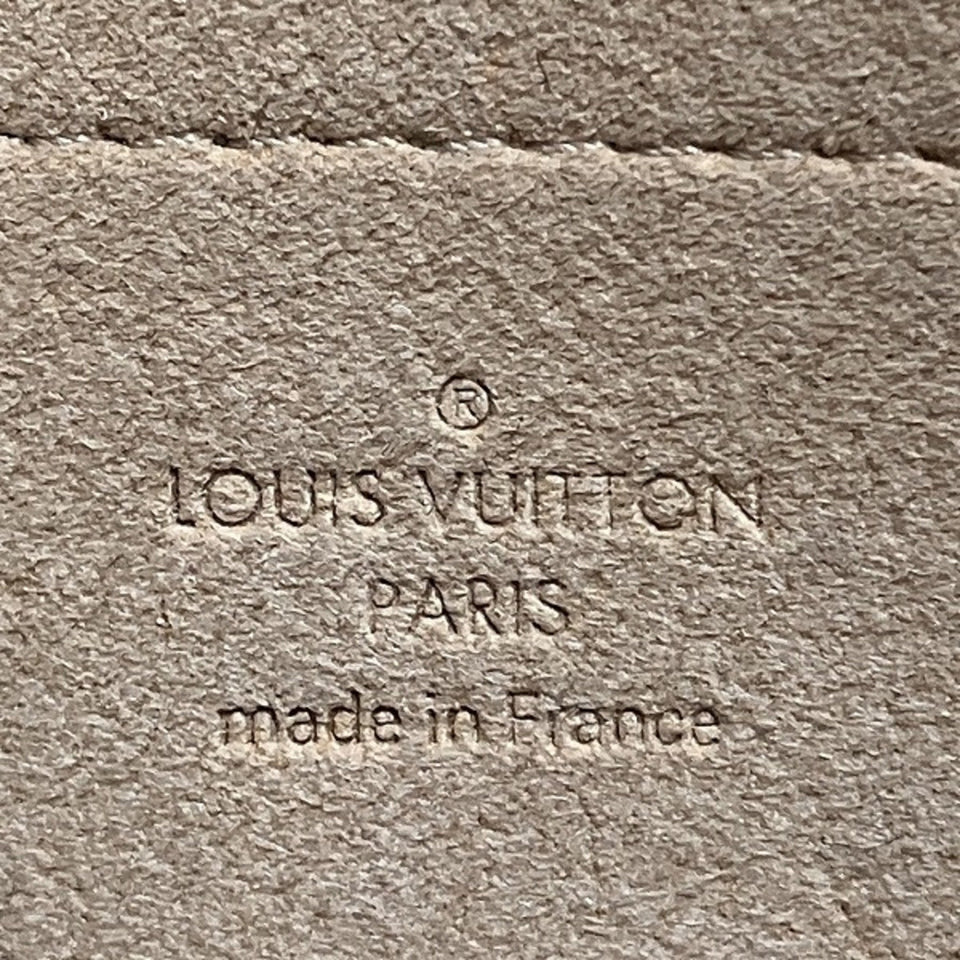 Louis Vuitton Mira  Canvas Clutch Bag