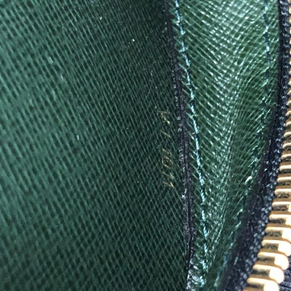 Louis Vuitton Baikal  Leather Clutch Bag