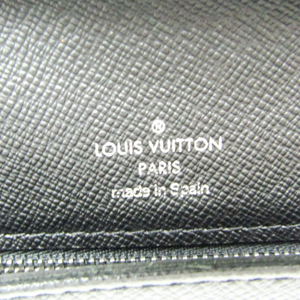 Louis Vuitton Selenga  Leather Clutch Bag