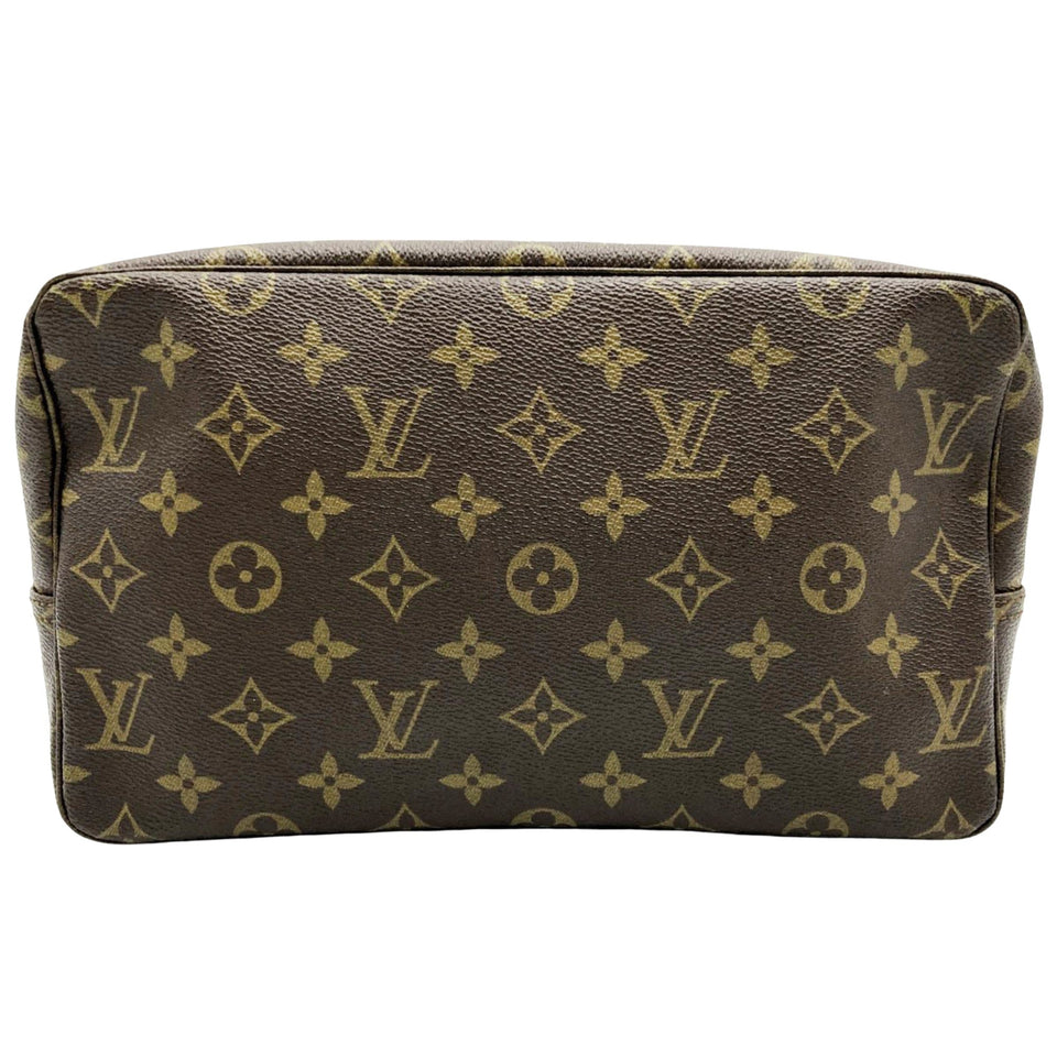 Louis Vuitton Trousse De Toilette  Canvas Clutch Bag