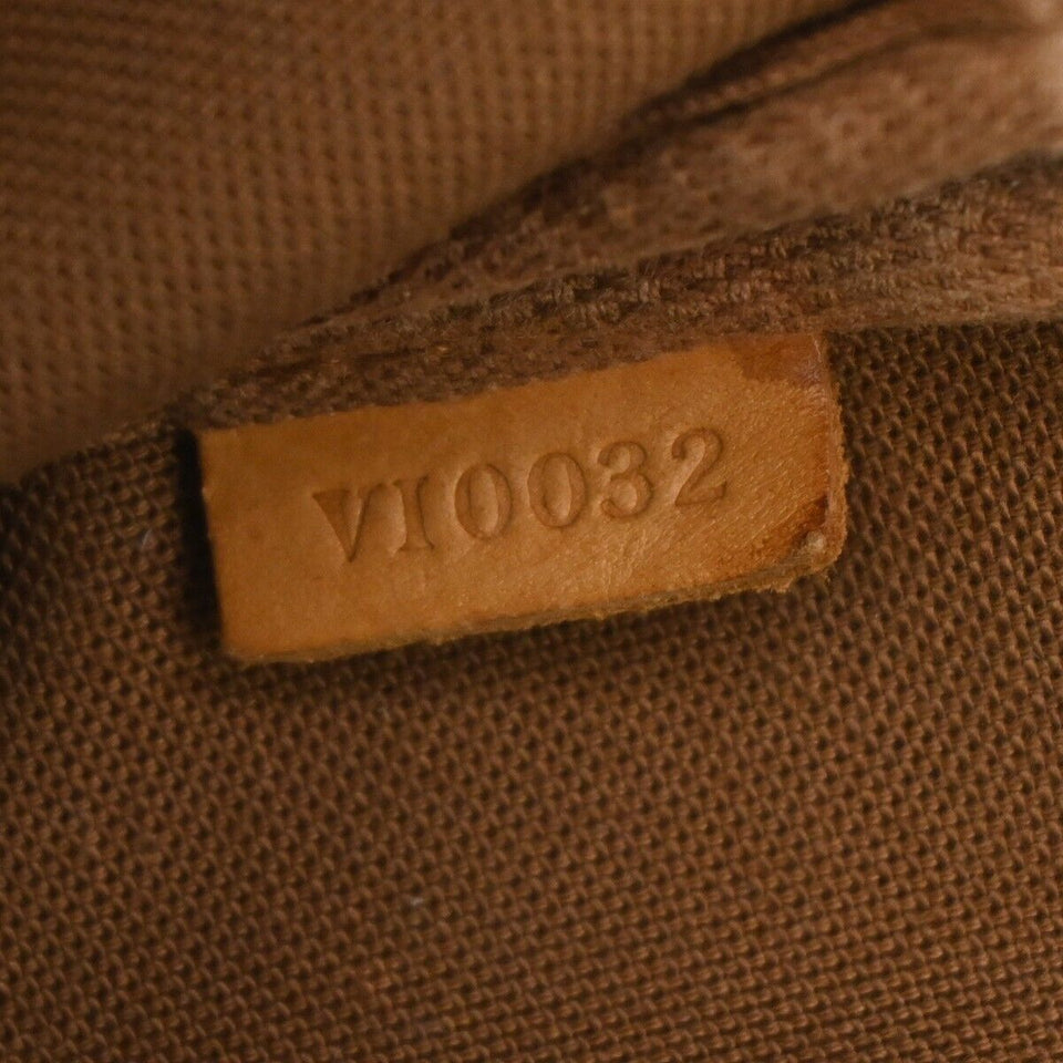 Louis Vuitton Pochette Accessoires  Canvas Clutch Bag