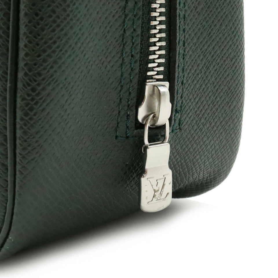 Louis Vuitton Trousse De Toilette  Leather Clutch Bag