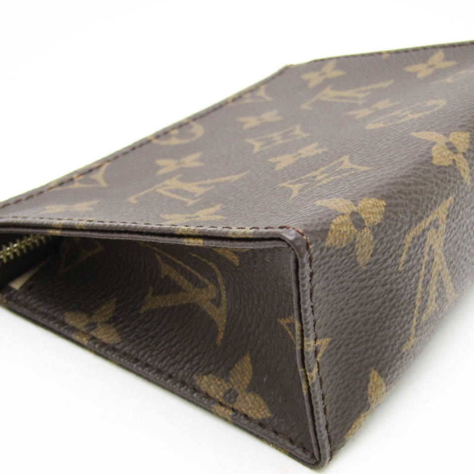 Louis Vuitton Trousse De Toilette  Canvas Clutch Bag