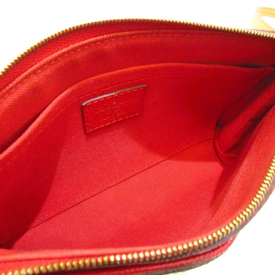 Louis Vuitton Pallas  Canvas Clutch Bag