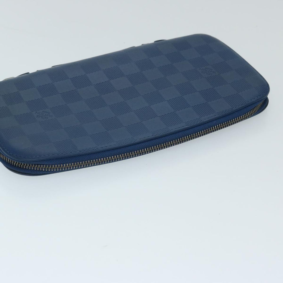 Louis Vuitton Atholl  Leather Clutch Bag