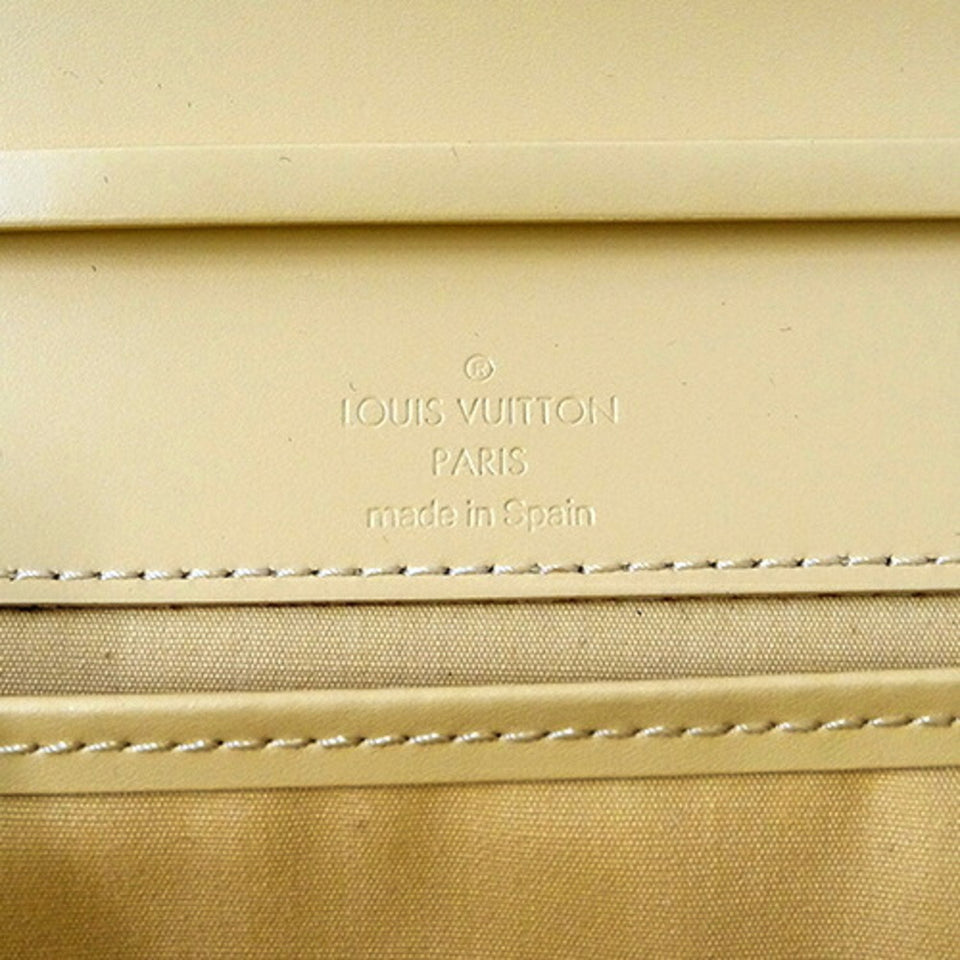Louis Vuitton Honfleur  Leather Clutch Bag