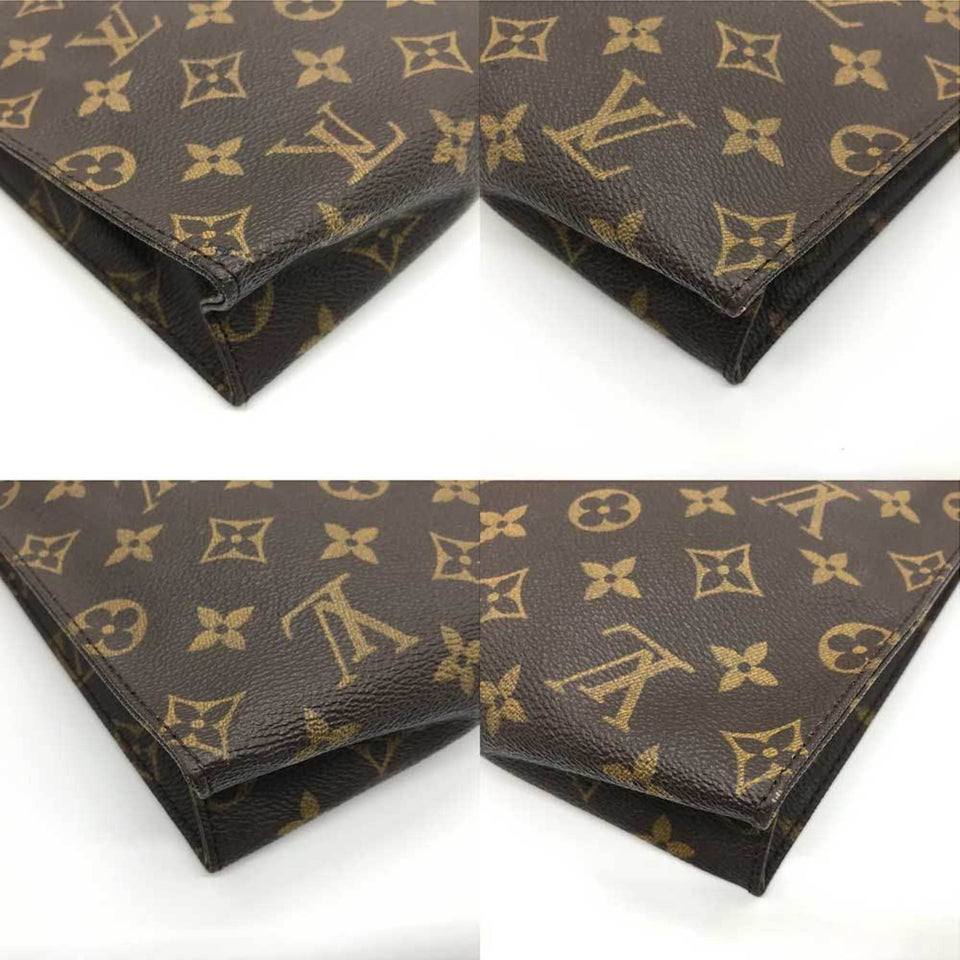Louis Vuitton Trousse De Toilette  Canvas Clutch Bag