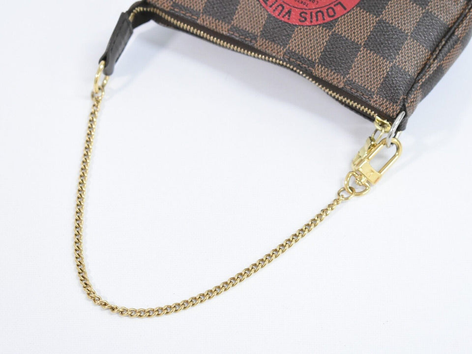 Louis Vuitton Mini Pochette Accessoires  Calfskin Clutch Bag