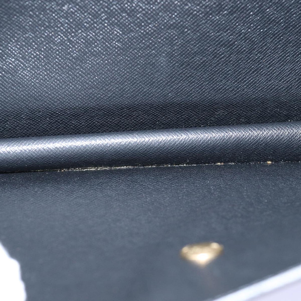 Louis Vuitton Montaigne Clutch Bag