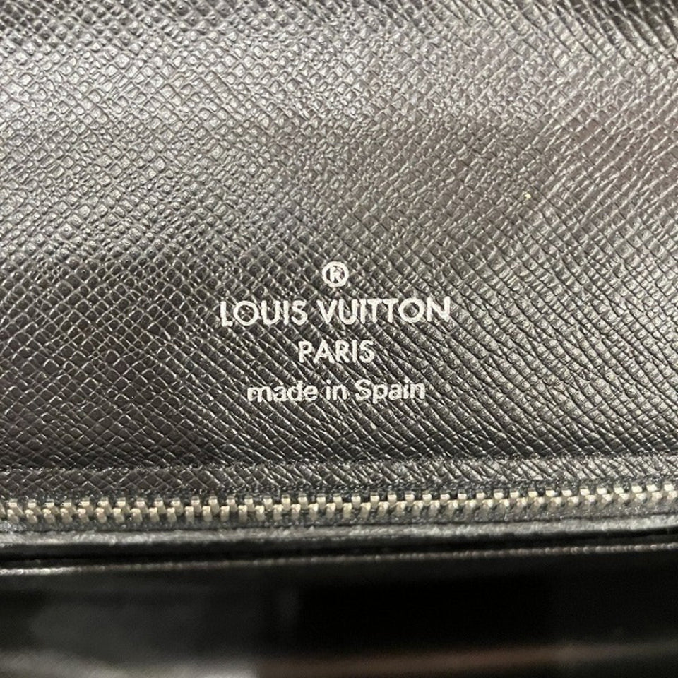 Louis Vuitton Selenga  Leather Clutch Bag