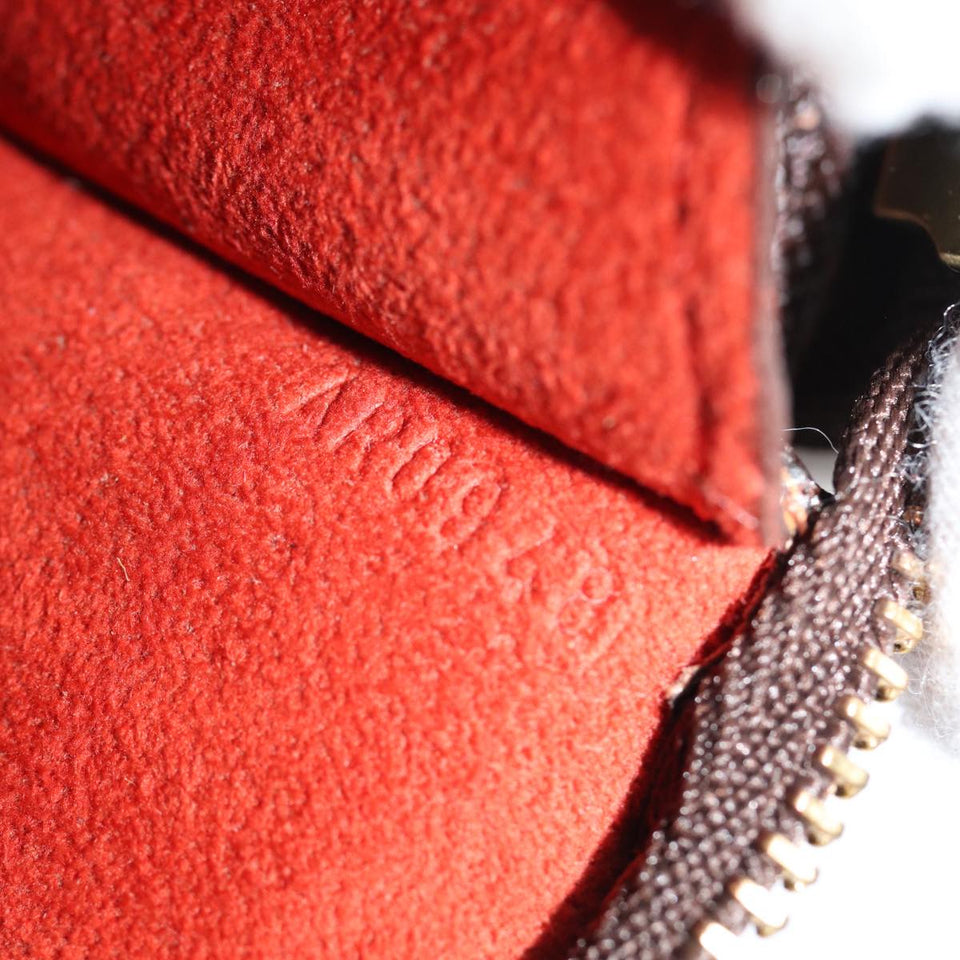 Louis Vuitton Trousse De Toilette  Canvas Clutch Bag
