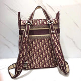 Dior Backpack In Burgundy Oblique Embroidered Canvas