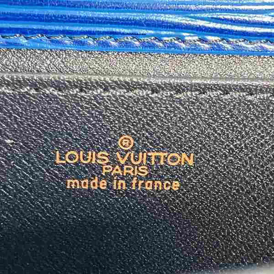 Louis Vuitton Jena  Leather Clutch Bag