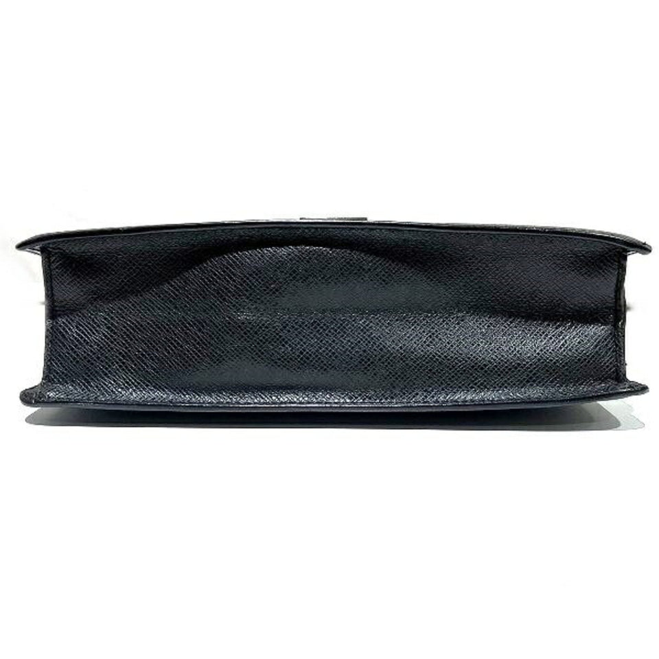 Louis Vuitton Selenga  Leather Clutch Bag