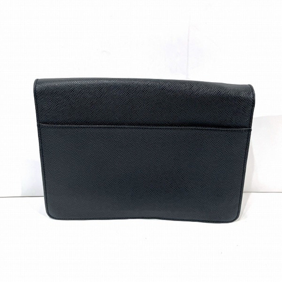Louis Vuitton Selenga  Leather Clutch Bag