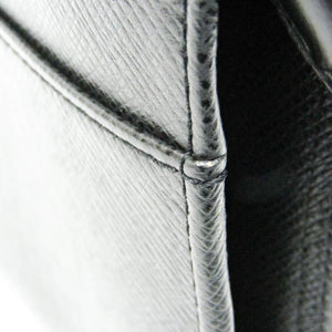 Louis Vuitton Selenga  Leather Clutch Bag
