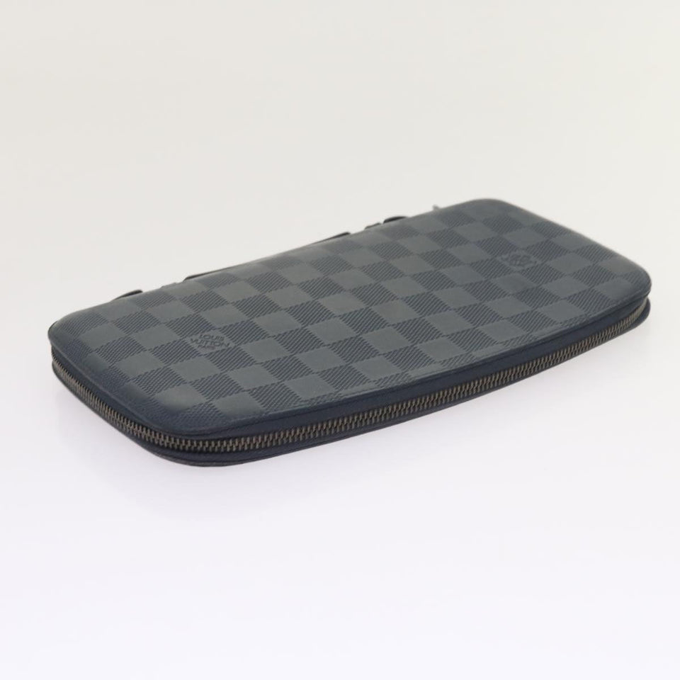 Louis Vuitton Atholl  Leather Clutch Bag