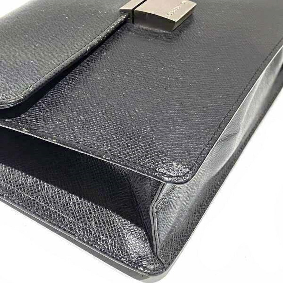Louis Vuitton Selenga  Leather Clutch Bag