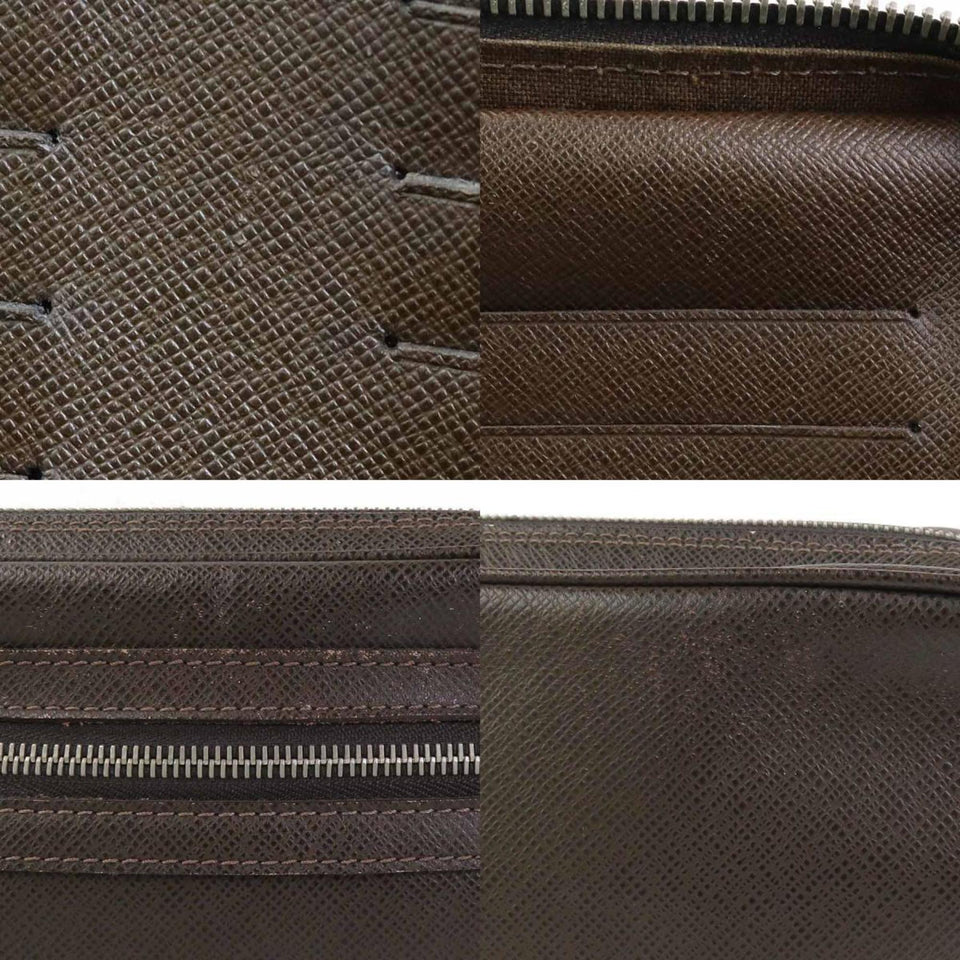 Louis Vuitton Pavel  Leather Clutch Bag