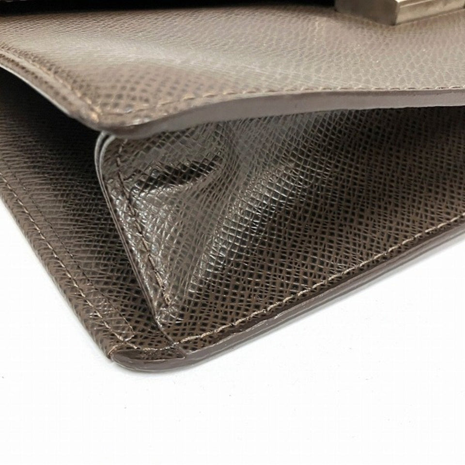 Louis Vuitton Selenga  Leather Clutch Bag
