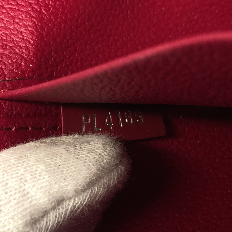 Louis Vuitton Nice  Leather Clutch Bag