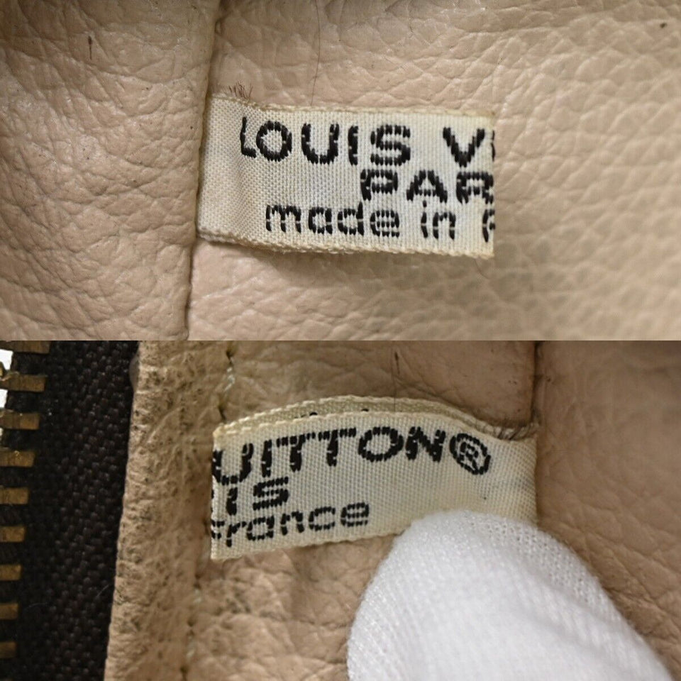 Louis Vuitton Trousse De Toilette  Canvas Clutch Bag