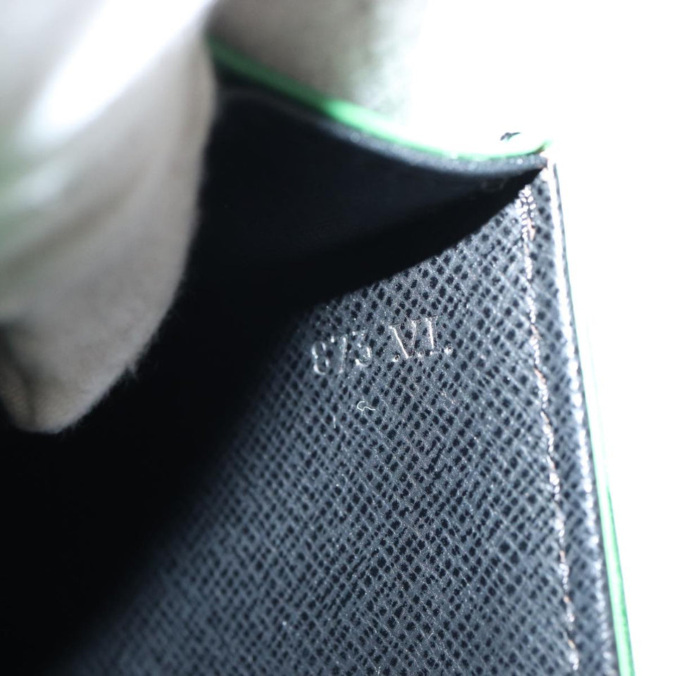 Louis Vuitton Léna  Leather Clutch Bag