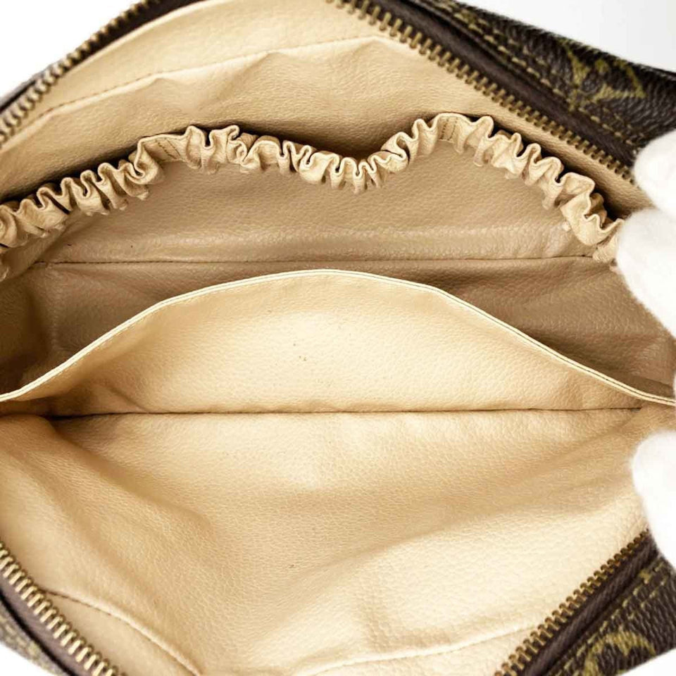 Louis Vuitton Trousse De Toilette  Canvas Clutch Bag