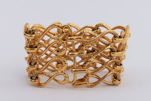 Bracelet articulé en métal doré Chanel