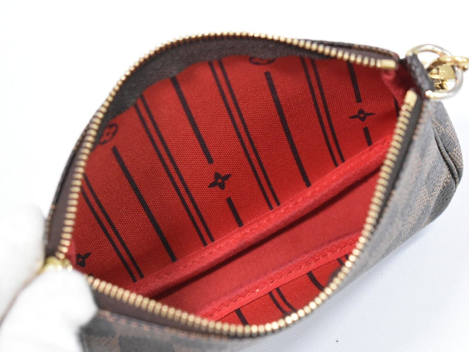 Louis Vuitton Mini Pochette Accessoires  Calfskin Clutch Bag