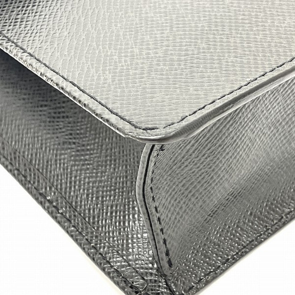 Louis Vuitton Selenga  Leather Clutch Bag