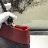 Louis Vuitton Pochette Tuileries Monogram Coated Canvas Red