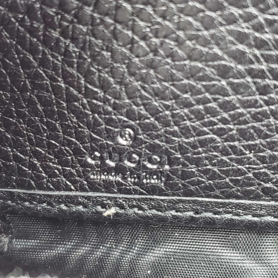 Gucci GG Leather Zippy Wallet