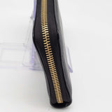 Gucci GG Leather Zippy Wallet